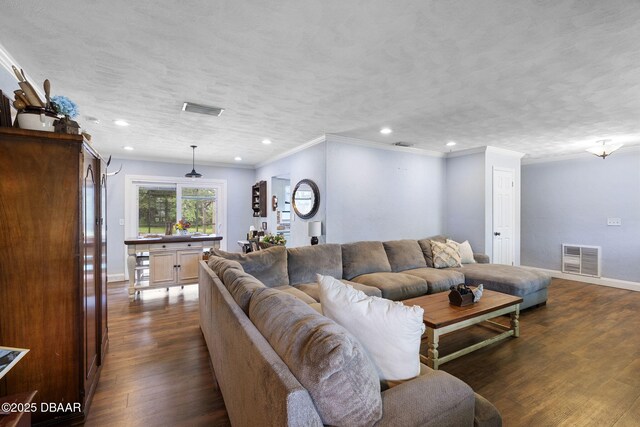 552 Hamlet Dr, Port Orange, FL 32127 - living area with dark wood-type flooring, crown molding, and recessed lighting