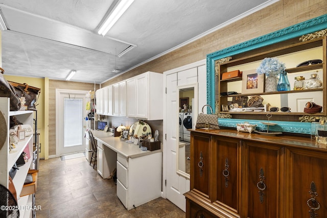 552 Hamlet Dr, Port Orange, FL 32127 - kitchen with white cabinetry, separate washer and dryer, open shelves, and a desk