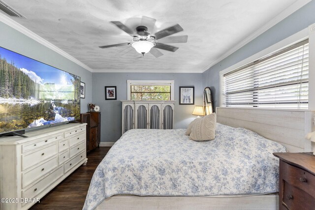 552 Hamlet Dr, Port Orange, FL 32127 - bedroom with dark wood-style flooring, a ceiling fan, and crown molding