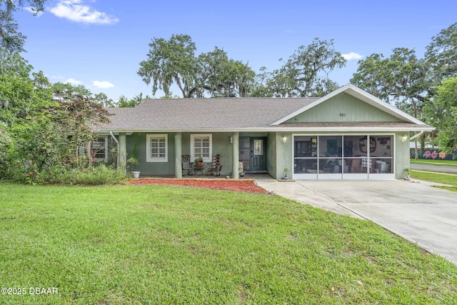 552 Hamlet Dr, Port Orange, FL 32127 - single story home with a front lawn, covered porch, stucco siding, and roof with shingles