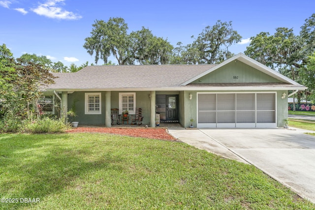 552 Hamlet Dr, Port Orange, FL 32127 - ranch-style house featuring an attached garage, covered porch, stucco siding, and a front lawn