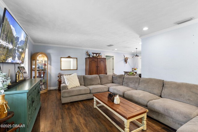 552 Hamlet Dr, Port Orange, FL 32127 - living area featuring arched walkways, dark wood-style floors, recessed lighting, and ornamental molding