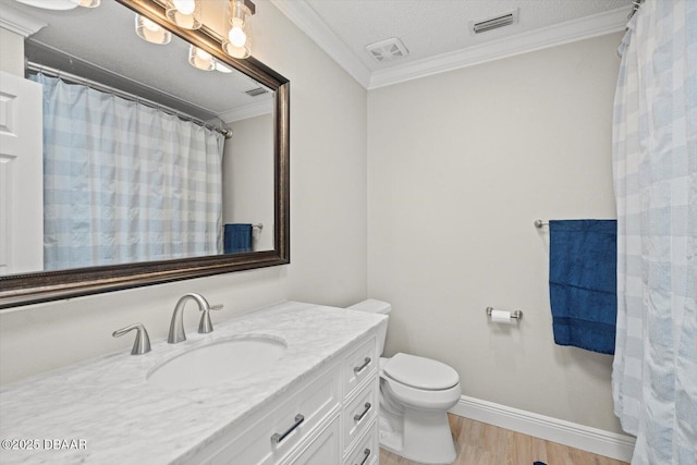 full bath with toilet, wood finished floors, vanity, and crown molding