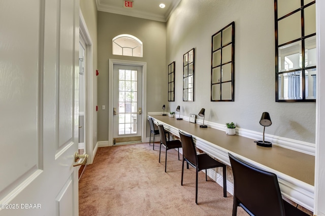 940 Village Trl Unit 6-109, Port Orange, FL 32127 - office featuring built in study area, light carpet, crown molding, baseboards, and a high ceiling