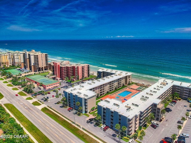 bird's eye view featuring a beach view and a water view