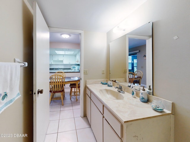 bathroom with vanity and tile patterned floors