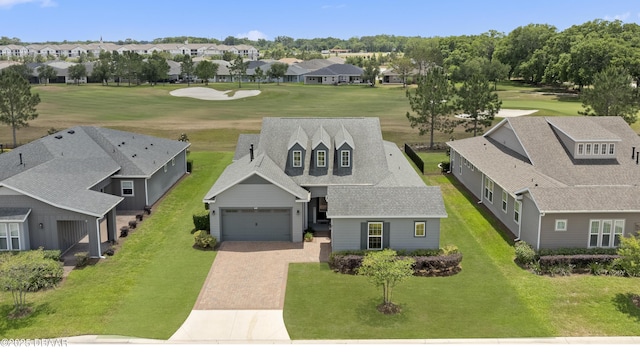 aerial view with view of golf course and a residential view