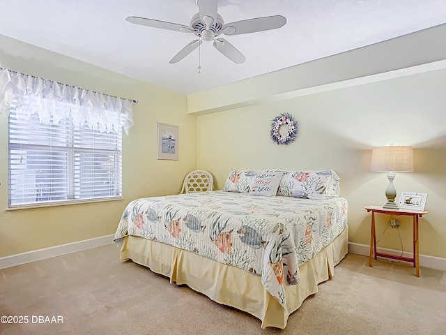 426 Bouchelle Dr Unit 303, New Smyrna Beach, FL 32169 - bedroom featuring carpet flooring, baseboards, and a ceiling fan