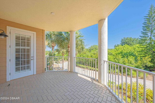 view of patio / terrace with a balcony