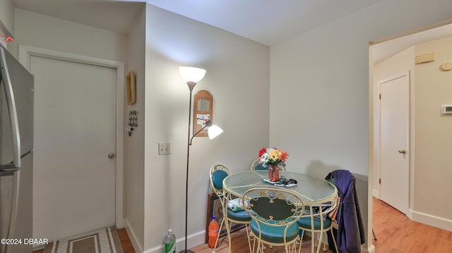 dining room featuring wood-type flooring