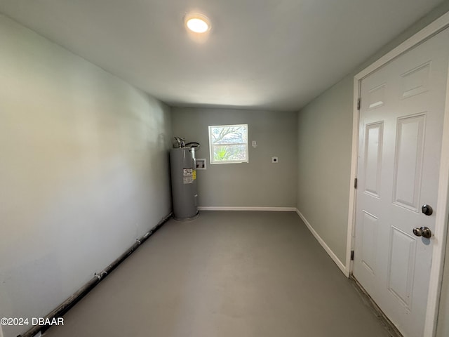 utility room featuring electric water heater