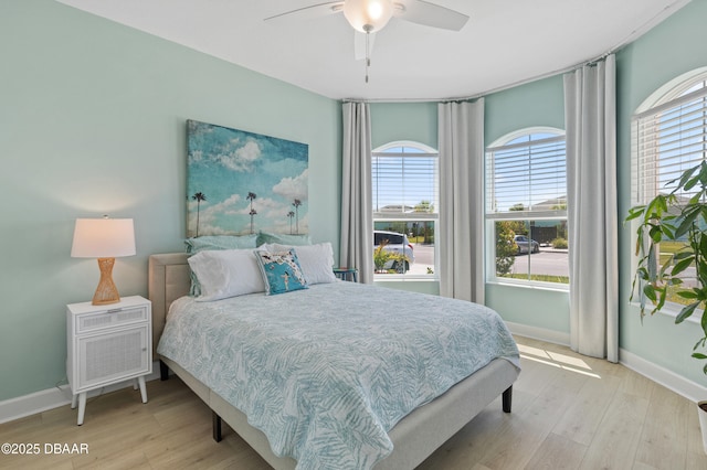 831 Coral Reef Way, Daytona Beach, FL 32124 - bedroom featuring a ceiling fan, light wood-type flooring, and baseboards