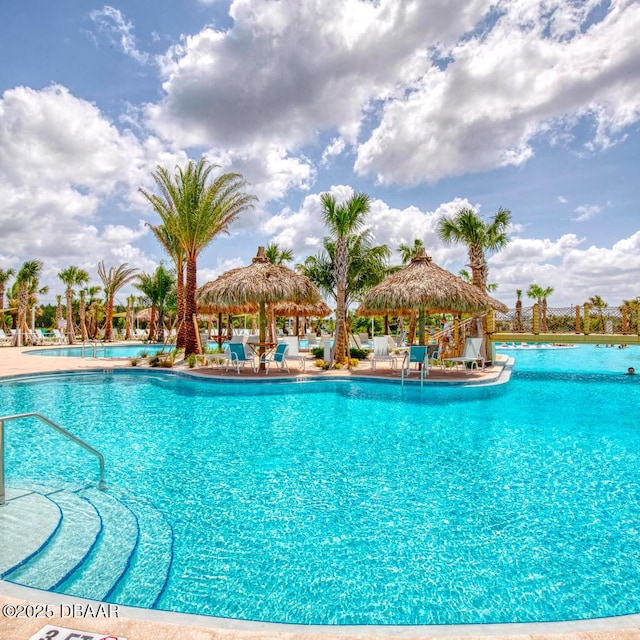 831 Coral Reef Way, Daytona Beach, FL 32124 - community pool with a gazebo and a patio area