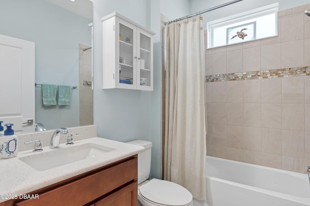 831 Coral Reef Way, Daytona Beach, FL 32124 - bathroom featuring vanity, shower / bath combination with curtain, and toilet