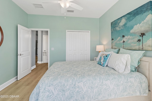 831 Coral Reef Way, Daytona Beach, FL 32124 - bedroom featuring wood finished floors, visible vents, a closet, and baseboards