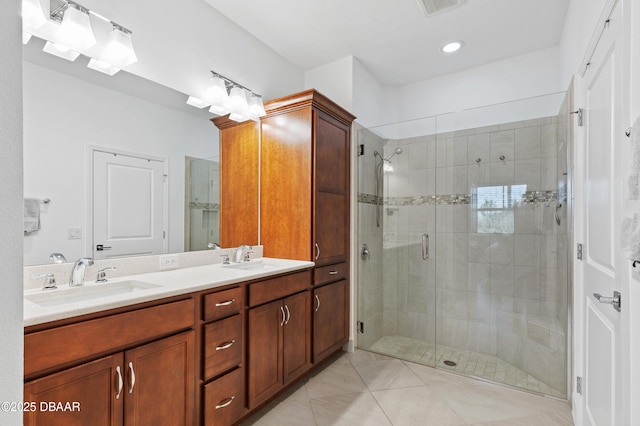 831 Coral Reef Way, Daytona Beach, FL 32124 - bathroom with double vanity, a shower stall, tile patterned floors, and a sink