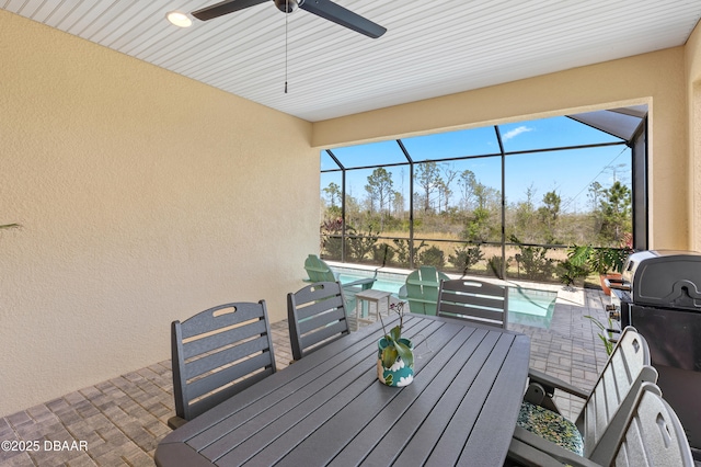 831 Coral Reef Way, Daytona Beach, FL 32124 - view of patio / terrace with glass enclosure, outdoor dining area, an outdoor pool, and ceiling fan