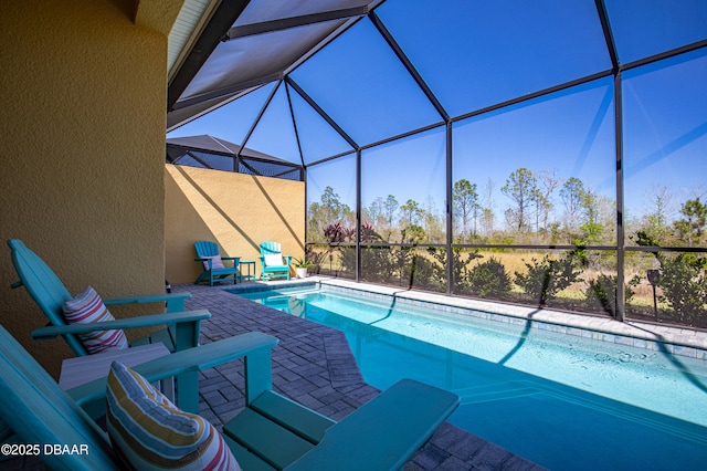 831 Coral Reef Way, Daytona Beach, FL 32124 - pool featuring a patio area and glass enclosure