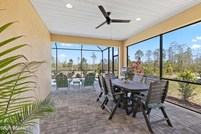831 Coral Reef Way, Daytona Beach, FL 32124 - sunroom / solarium featuring outdoor dining space, an outdoor living space, and ceiling fan
