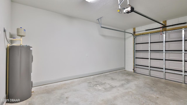 garage with a garage door opener and water heater