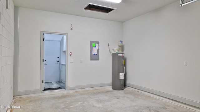 garage featuring electric panel and electric water heater