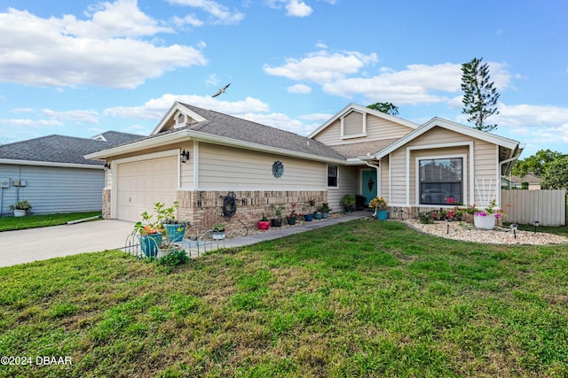 view of front of house featuring a garage and a front lawn