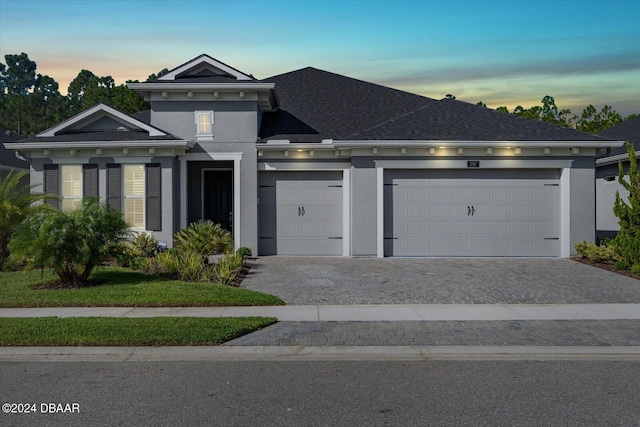 view of front of property featuring a garage