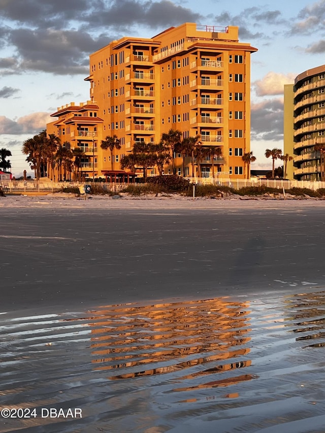 701 N Atlantic Ave Unit 203, New Smyrna Beach, FL 32169 - view of outdoor building at dusk