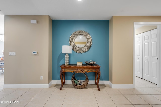 hall with light tile patterned flooring