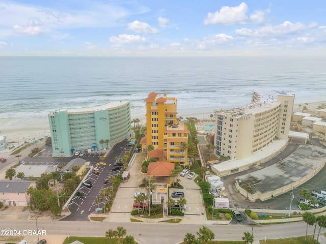 bird's eye view with a view of the beach and a water view