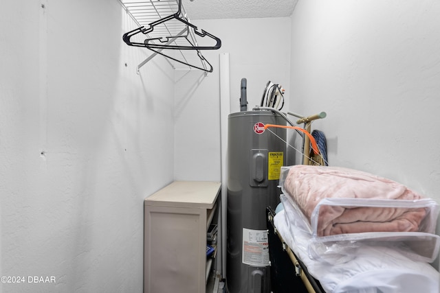 utility room with electric water heater