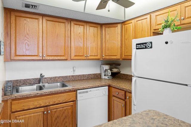 kitchen featuring sink, white appliances, and ceiling fan