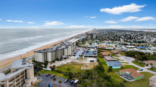 drone / aerial view with a view of the beach and a water view