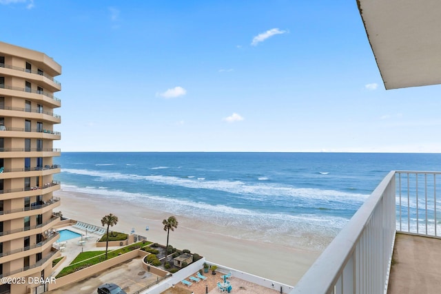 property view of water featuring a beach view