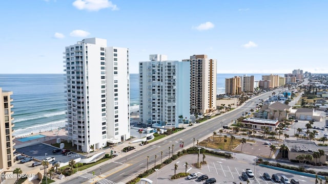 bird's eye view featuring a water view and a city view