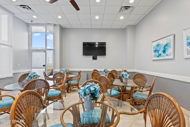 dining space with light tile patterned floors, visible vents, and recessed lighting