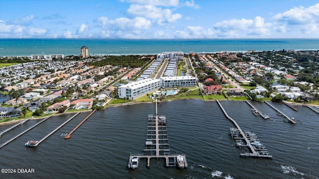 birds eye view of property featuring a water view