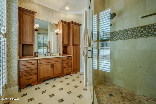 full bath with crown molding, a stall shower, vanity, and wallpapered walls