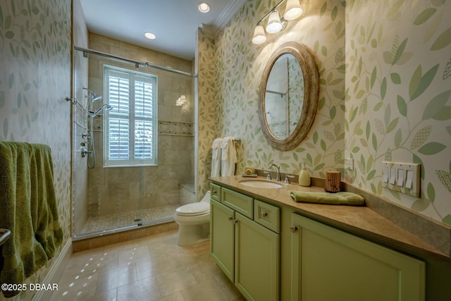 full bathroom featuring toilet, a stall shower, vanity, tile patterned flooring, and wallpapered walls