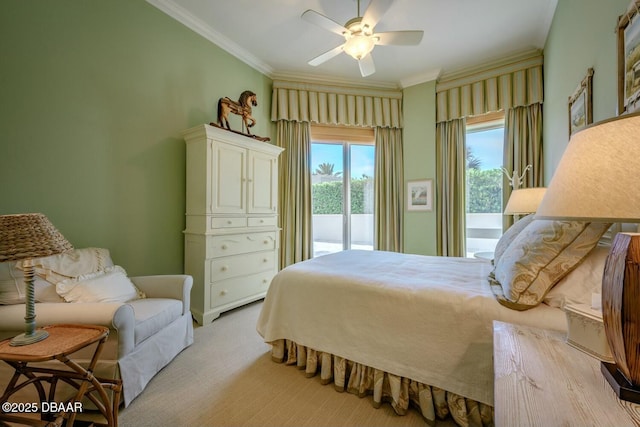 bedroom featuring access to outside, ceiling fan, crown molding, and light colored carpet