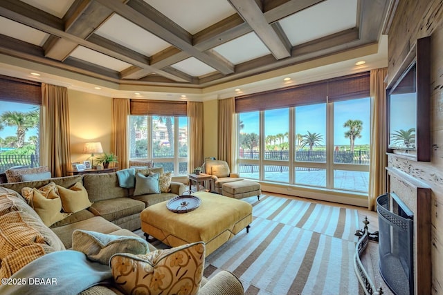 living area featuring a fireplace, recessed lighting, light carpet, coffered ceiling, and beamed ceiling