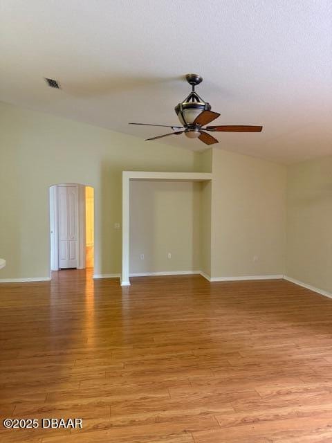 107 Beacon Mill Ln, Palm Coast, FL 32137 - empty room with a ceiling fan and light wood-type flooring