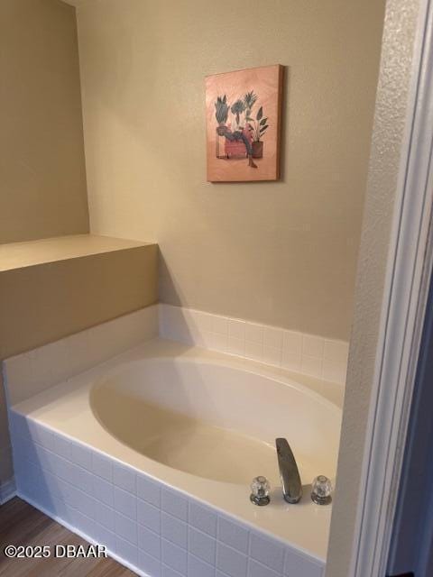 107 Beacon Mill Ln, Palm Coast, FL 32137 - full bath featuring a bath and wood finished floors