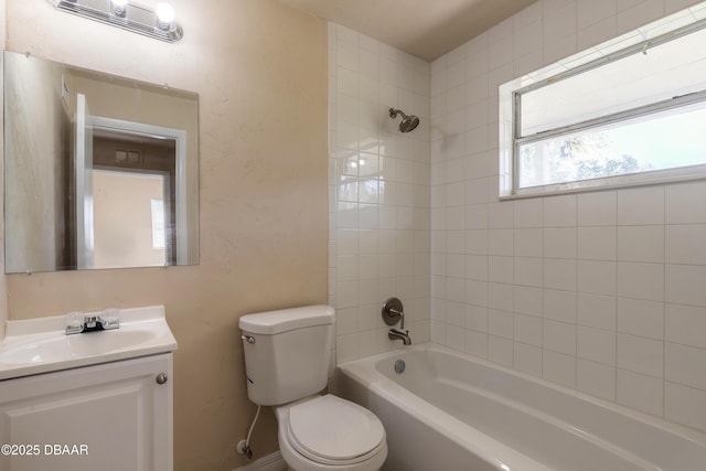 full bath with toilet, washtub / shower combination, and vanity