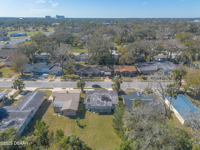 birds eye view of property with a residential view