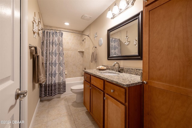 full bathroom featuring tile patterned floors, vanity, toilet, and shower / tub combo