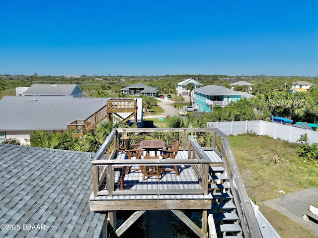 1811 N Central Ave, Flagler Beach, FL 32136 - exterior space featuring fence, outdoor dining space, and a deck