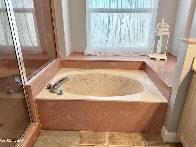 1811 N Central Ave, Flagler Beach, FL 32136 - full bathroom featuring plenty of natural light, a stall shower, and a bath