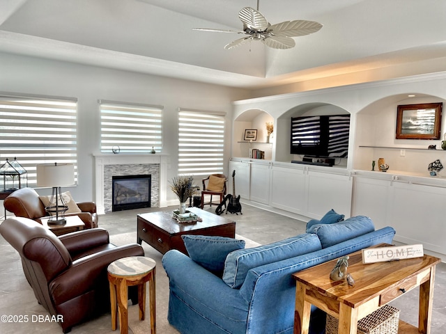 1811 N Central Ave, Flagler Beach, FL 32136 - living area featuring a glass covered fireplace and ceiling fan