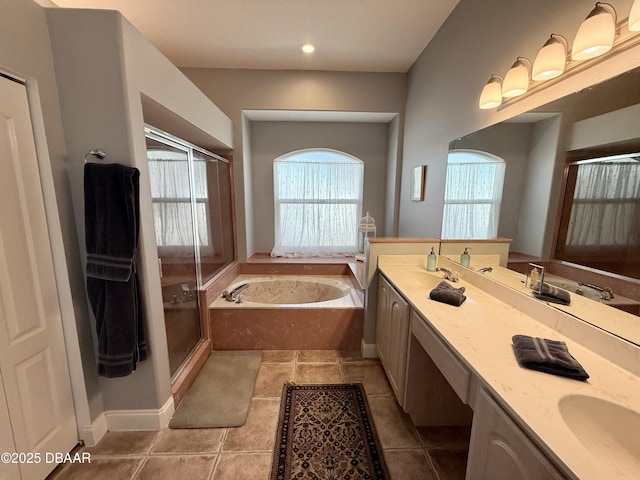 1811 N Central Ave, Flagler Beach, FL 32136 - full bath featuring double vanity, a bath, a stall shower, and a wealth of natural light